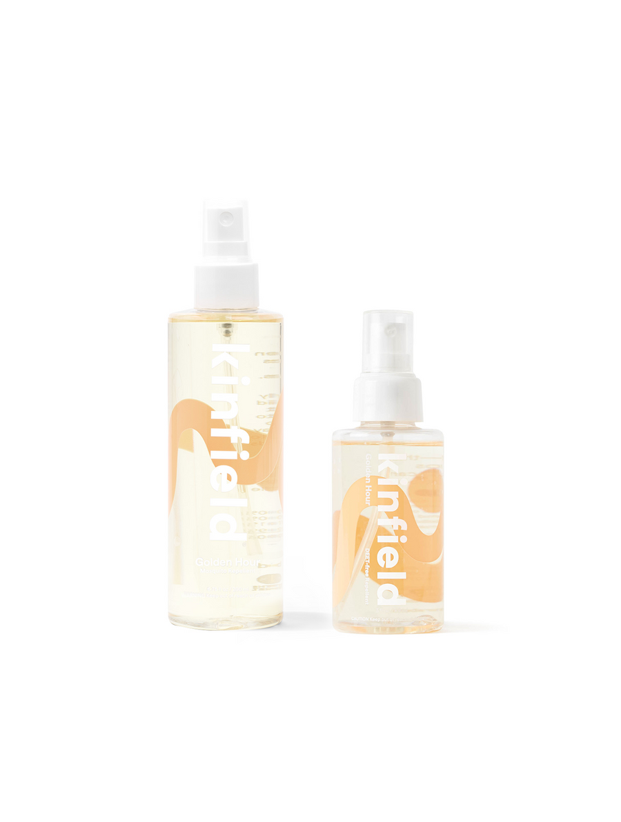 Kinfield's Golden Hour mosquito repellent spray in both sizes on a white background.