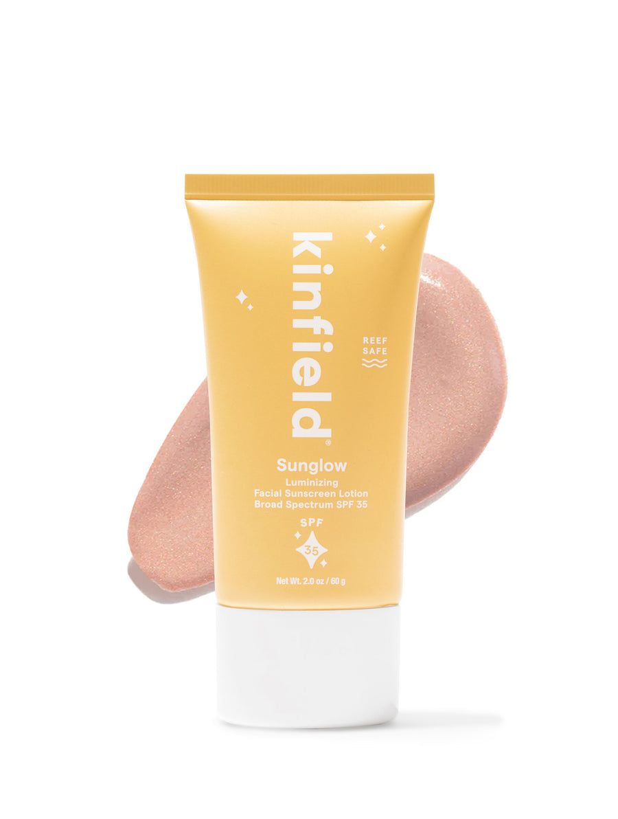 A tube of Kinfield SPF 35 on a white background with a swatch of product.