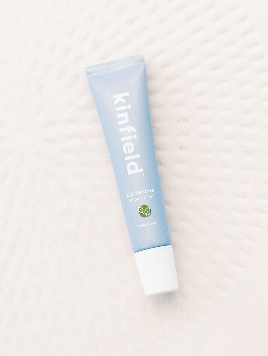 Lip Rescue sits on a white textured table.