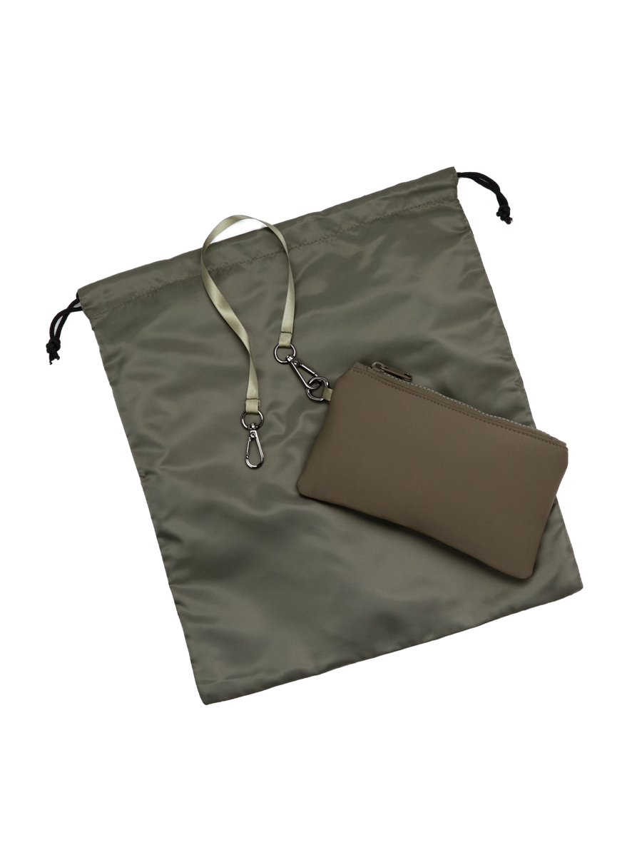 Interior shoe bag and separate key pouch included with Kinfield Sport Duffle Bag in Olive.